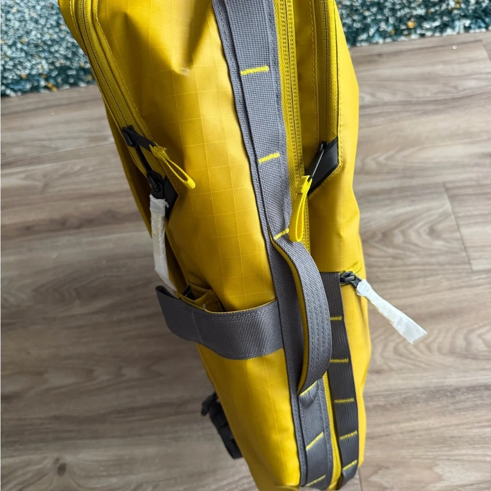The North Face Men's Yellow Backpack with Gray Accents
